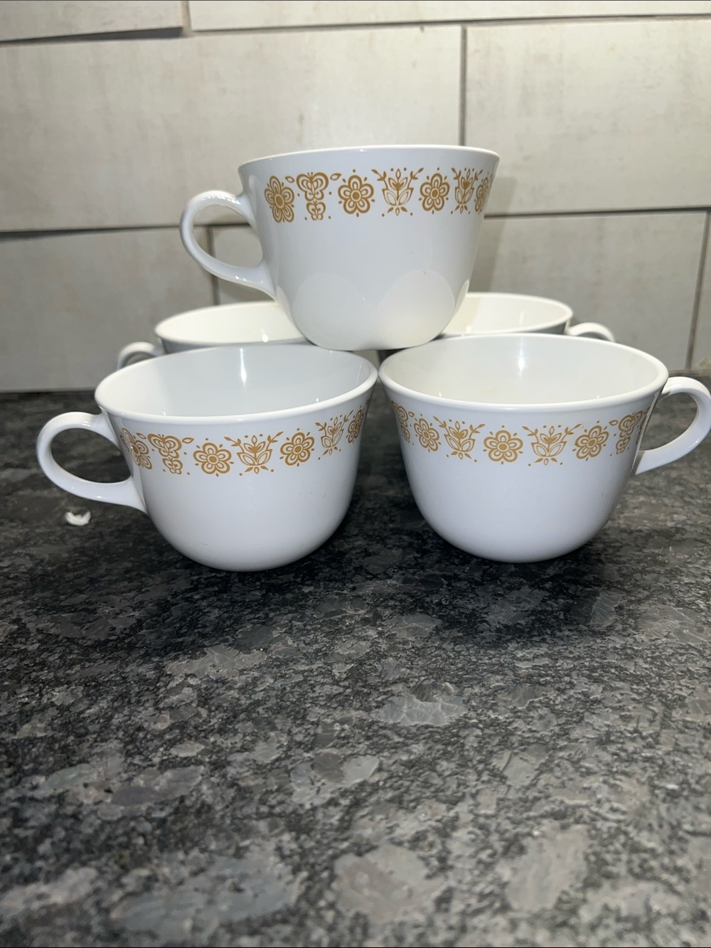 Set of 5 Corelle Butterfly Gold coffee/tea cups. In like new condition